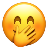 Face with hand over mouth